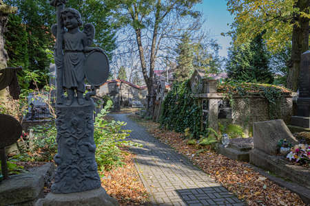 TARNOW, POLAND - OCTOBER 09, 2021: Polish city in Malopolska often called "Pearl of Polish Renaissance". Europe's most beautiful town according CNN. o / p old cemeteryのeditorial素材
