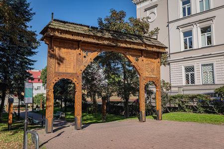 TARNOW, POLAND - OCTOBER 09, 2021: Polish city in Malopolska often called "Pearl of Polish Renaissance". Europe's most beautiful town according CNN. o / p Seklerska Gate, symbolic wooden carved gate. It is a gift for Tarnow from the Hungarian Irott Szのeditorial素材