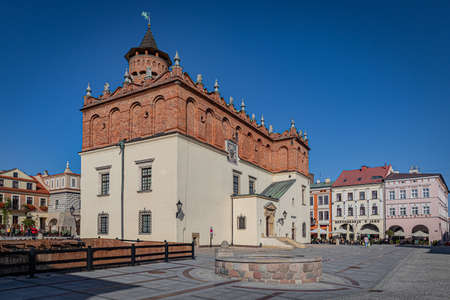 TARNOW, POLAND - OCTOBER 09, 2021: Polish city in Malopolska often called "Pearl of Polish Renaissance". Europe's most beautiful town according CNN. o / p enchanting market square with town hall and beautiful tenemenntsのeditorial素材