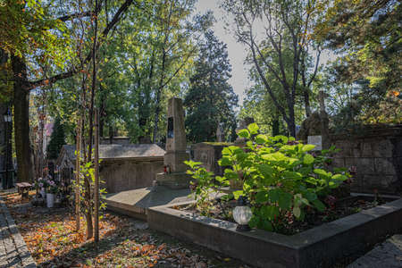 TARNOW, POLAND - OCTOBER 09, 2021: Polish city in Malopolska often called "Pearl of Polish Renaissance". Europe's most beautiful town according CNN. o / p old cemeteryのeditorial素材