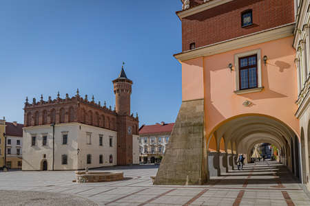 TARNOW, POLAND - OCTOBER 10, 2021: Polish city in Malopolska often called "Pearl of Polish Renaissance". Europe's most beautiful town according CNN. o / p enchanting market square with town hall and beautiful tenemenntsのeditorial素材