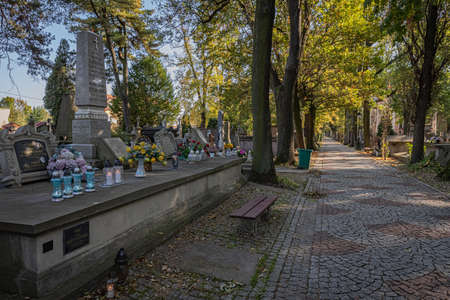 TARNOW, POLAND - OCTOBER 09, 2021: Polish city in Malopolska often called "Pearl of Polish Renaissance". Europe's most beautiful town according CNN. o / p old cemeteryのeditorial素材