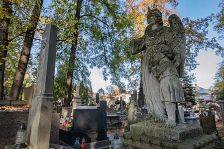 TARNOW, POLAND - OCTOBER 09, 2021: Polish city in Malopolska often called "Pearl of Polish Renaissance". Europe's most beautiful town according CNN. o / p old cemeteryのeditorial素材