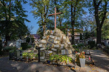 TARNOW, POLAND - OCTOBER 09, 2021: Polish city in Malopolska often called "Pearl of Polish Renaissance". Europe's most beautiful town according CNN. o / p old cemeteryのeditorial素材