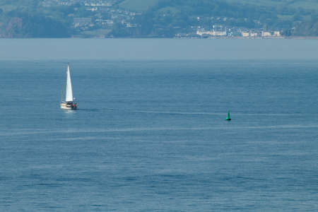 floating boats on the sea in Exmouth, England