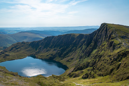 Climbing and lake view on cadair idris hill in wales 2022.の写真素材