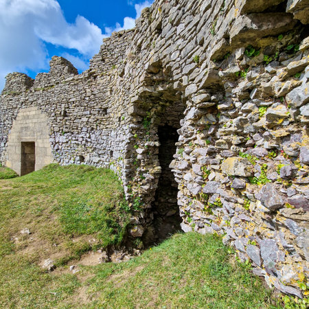 Originally built in the 12th century, Pennard Castle played a strategic role in the defense of the area. Over the centuries, it fell into disrepair and now stands as a romantic ruin. As you wander through the site, you can imagine the castle's former glorのeditorial素材