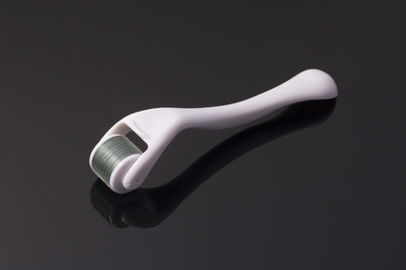 derma roller for medical micro needling therapy. Tool also known as: Dermaroller, mesoroller, mesoroller, mesopen.の写真素材