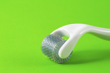 Dermaroller for medical micro needling therapy. Tool also known as: Derma roller, mesoroller, meso-roller, mesopen.の写真素材