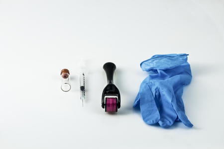 Dermaroller for medical micro needling therapy. Tool also known as: Derma roller, mesoroller, meso-roller, mesopen.の写真素材