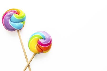 rainbow lollipop on color backgroundの写真素材