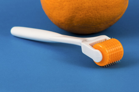 Dermaroller for medical micro needling therapy. Tool also known as: Derma roller, mesoroller, meso-roller, mesopen.の写真素材