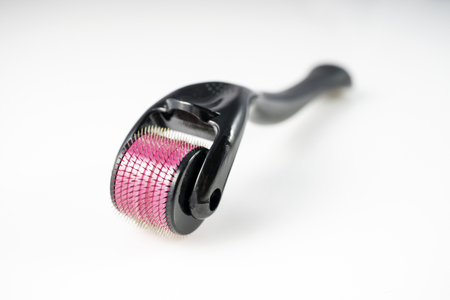 Dermaroller for medical micro needling therapy. Tool also known as: Derma roller, mesoroller, meso-roller, mesopen.の写真素材