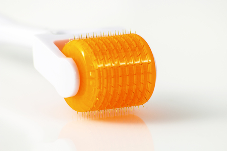Dermaroller for medical micro needling therapy. Tool also known as: Derma roller, mesoroller, meso-roller, mesopen.の写真素材