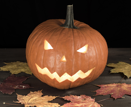 traditional jack-o-lantern halloween pumpkin with smiling faceの写真素材
