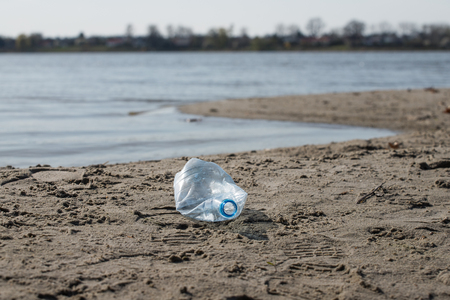 Used plastic bottle trash on the beach. natural environment pollution dangerの写真素材