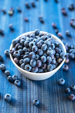 Fresh tasty blueberry  on woodenの写真素材