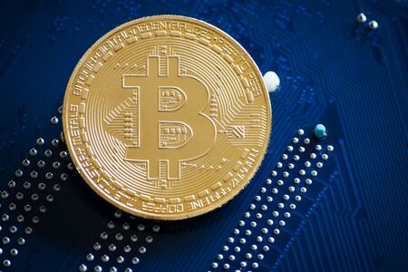 Bitcoin symbol coin on computer partの写真素材