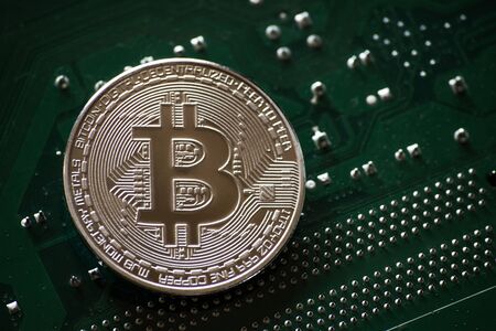 Bitcoin symbol coin on computer partの写真素材
