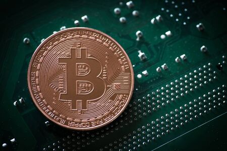 Bitcoin symbol coin on computer partの写真素材
