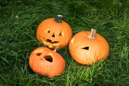 Halloween jack-o-lantern carved pumpkin decorationの写真素材