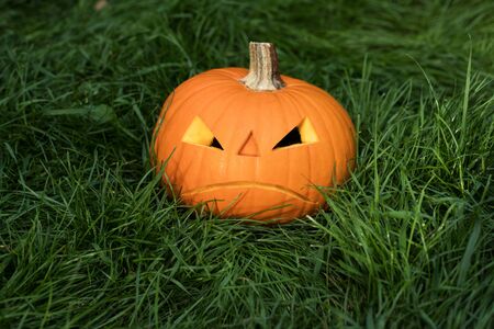 Halloween jack-o-lantern carved pumpkin decorationの写真素材