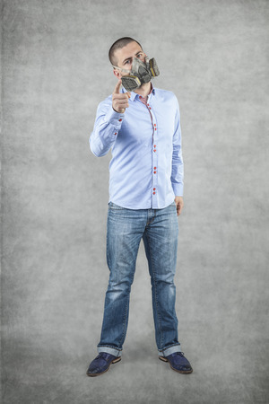 Man in the mask pointing at youの写真素材