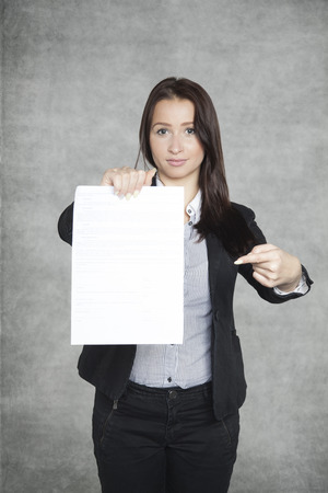 businesswoman with a contract for youの写真素材
