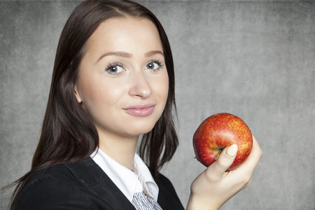 business woman with appleの写真素材