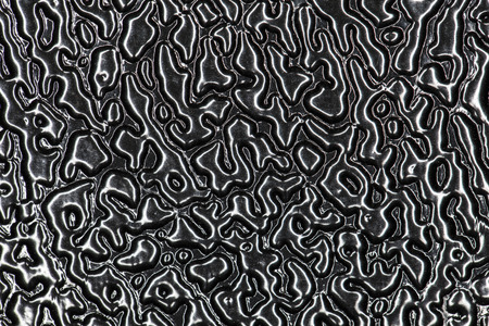 black and silver surface backgroundの写真素材