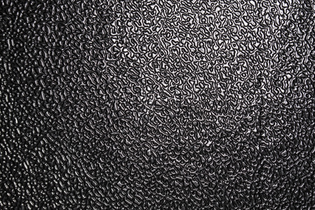 black and silver surface macro backgroundの写真素材
