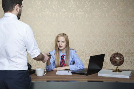 business woman accepts bribesの写真素材