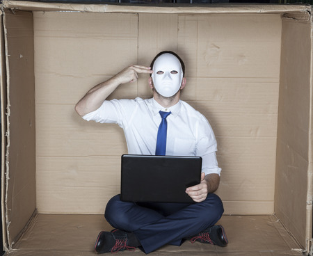 businessman shoots himself in the headの写真素材