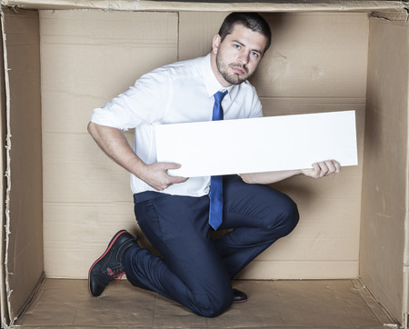 Advertising in the hands of businessmanの写真素材
