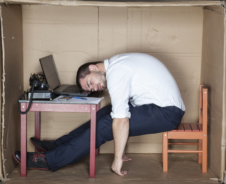 businessman sleeping in the officeの写真素材