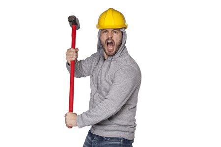 builder on a white background, holding a hammer and shoutingの写真素材