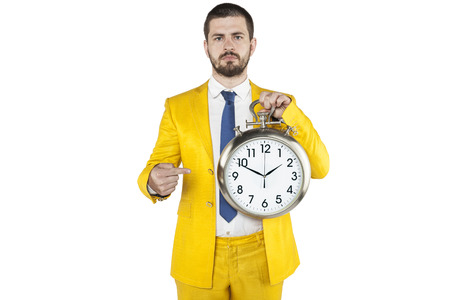 focused businessman pointing at the clock