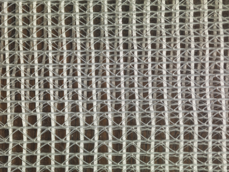 grid of white thread
