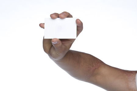 Male hand showing white blank sheet, advertising space, white background