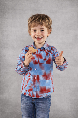 thumb up for nice cookie, businessman is a testerの写真素材