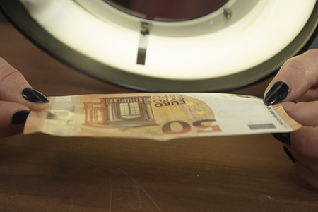 money checked for authenticity