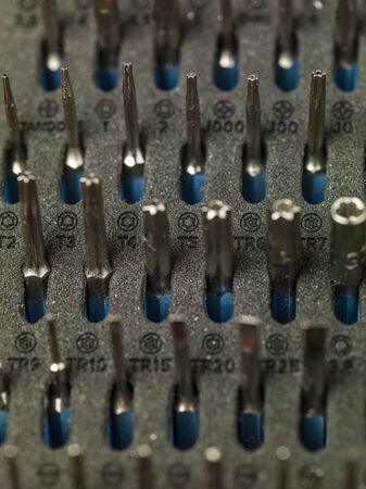 Close-up on bits, metal tips for various screws