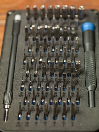 Close-up on bits, metal tips for various screws