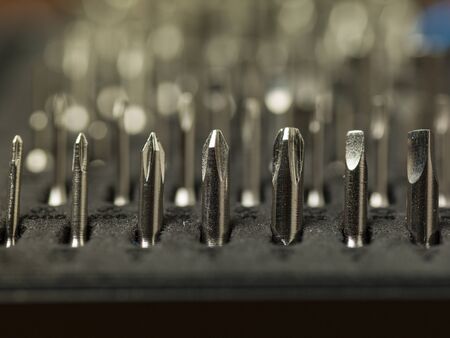 Close-up on bits, metal tips for various screws