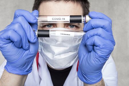 close-up of a COVID-19 ampoule, material for laboratory tests, close upの写真素材