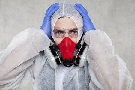 portrait of a virologist in a protective suitの写真素材