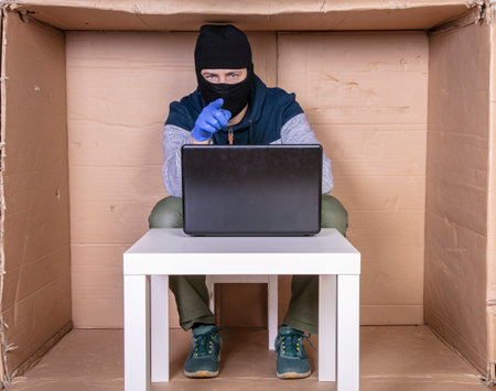 thief points to you as the next victim of an internet crimeの写真素材
