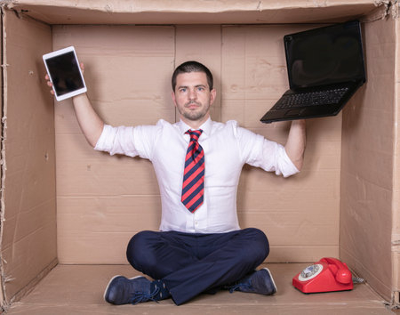 businessman presents tools for working on the internetの写真素材