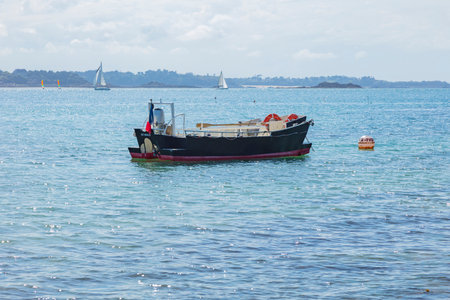 boat on the water with the inscription St Malo, Franceの写真素材