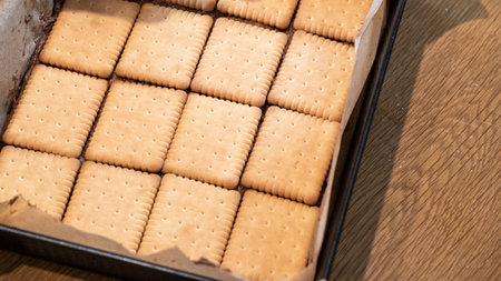 Close up of a box of crackers on a wooden table.の写真素材
